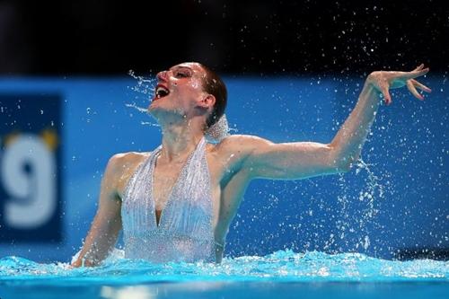 Svetlana Romashina combina esporte e arte no nado sincronizado / Foto: Quinn Rooney / COI 