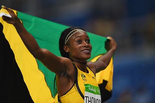 Velocista caribenha venceu os 200m rasos, mesma prova em que o astro se classificou à final / Foto: Shaun Botterill/Getty Images